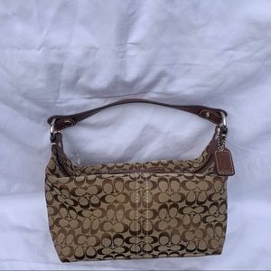 Never used Coach monogram mini handbag